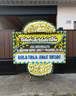 Papan Bunga Duka di Tobat